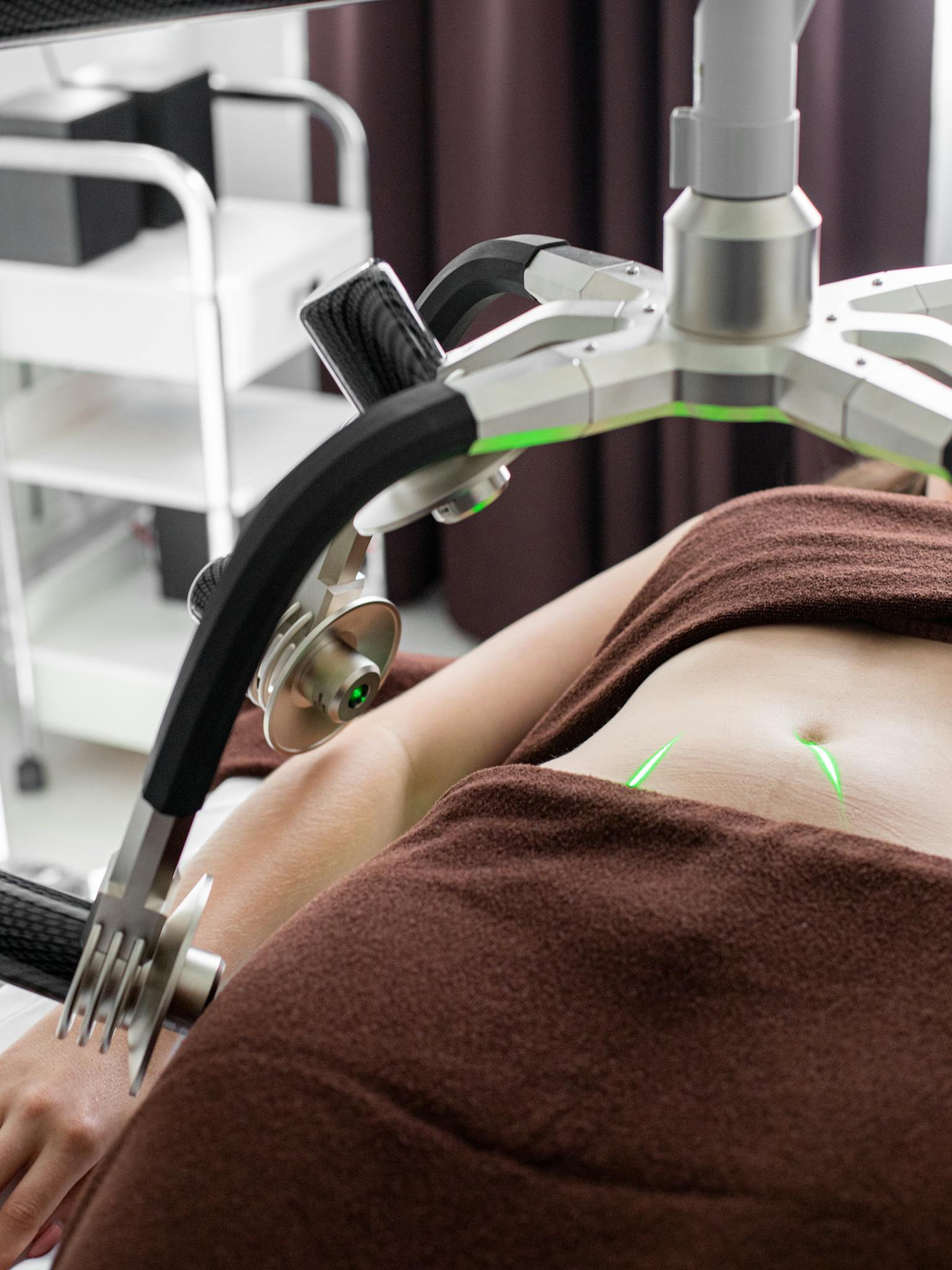 A modern laser device used in a clinic for non-invasive body contouring and weight loss.